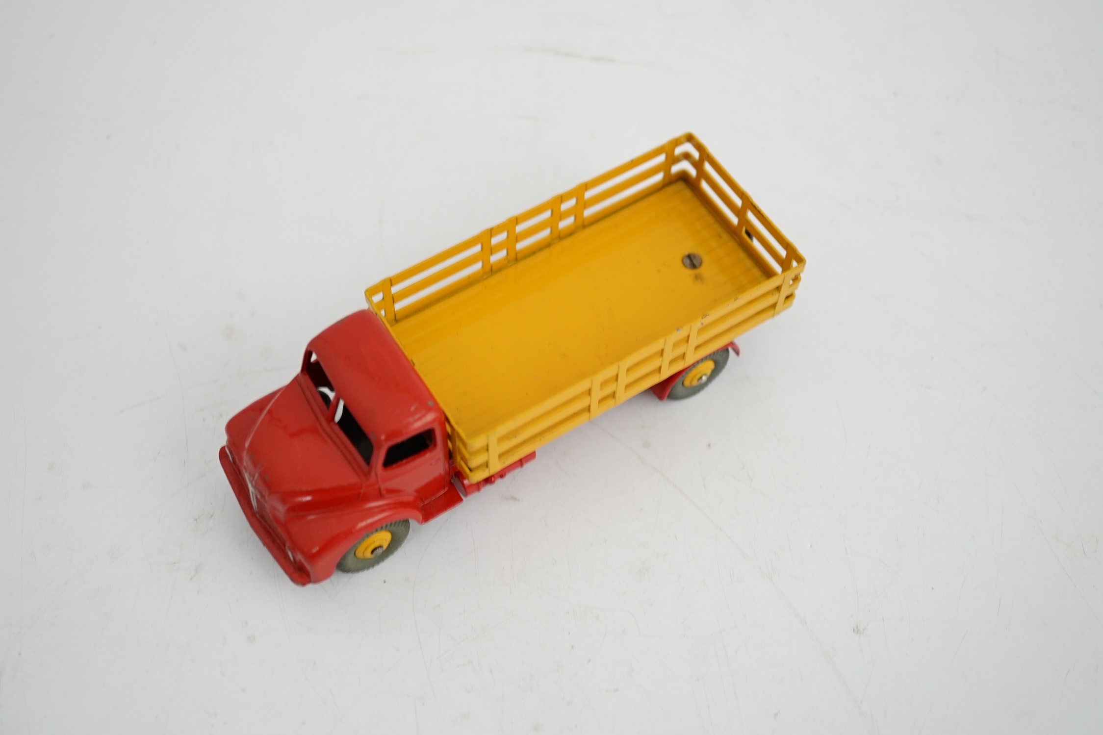 A boxed Dinky Supertoys Leyland Comet Lorry (531), with red cab and chassis, yellow stake body and yellow wheels